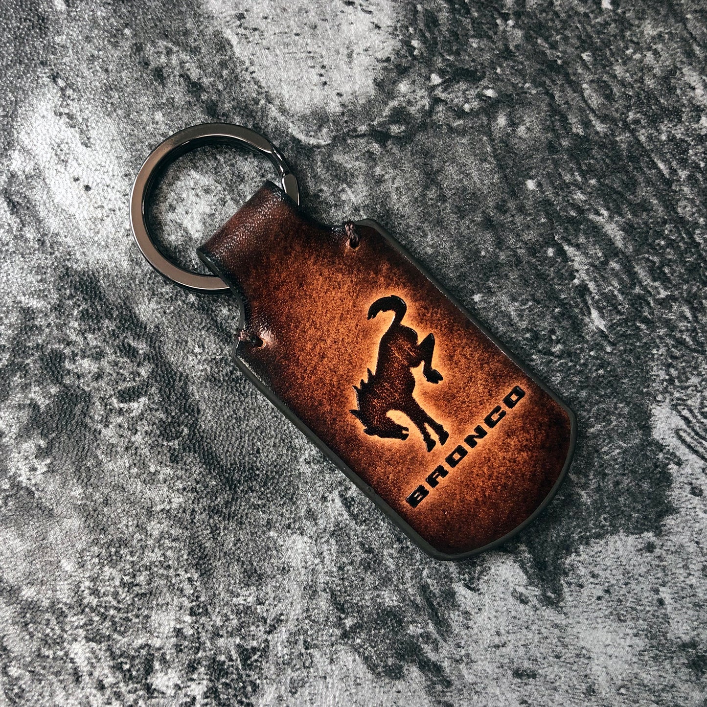 Handmade vintage Leather keychain in Brown. Embossed Ford Bronco