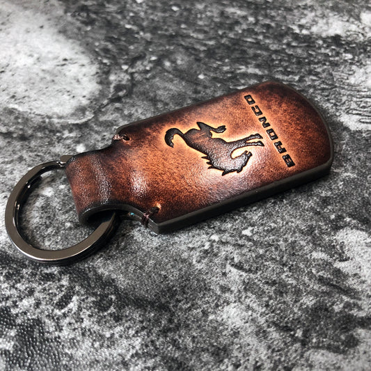 Handmade vintage Leather keychain in Brown. Embossed Ford Bronco