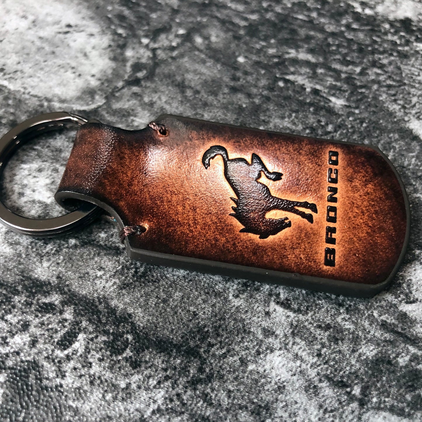 Handmade vintage Leather keychain in Brown. Embossed Ford Bronco