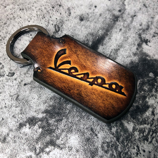 Vespa is embossed, vintage Leather keychain in Brown