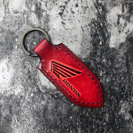 Motorcycle leather keychain in Red(Pointed shape) wing is embossed