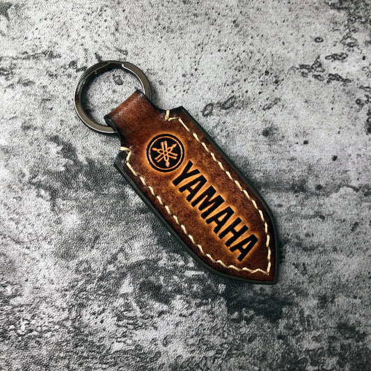 Motorcycle leather keychain in Brown(Pointed shape) Yamaha is embossed