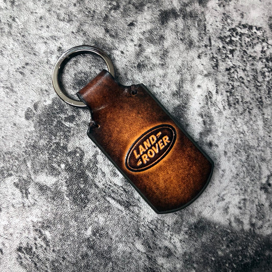 Handmade vintage Leather keychain in Brown. Embossed Land Rover