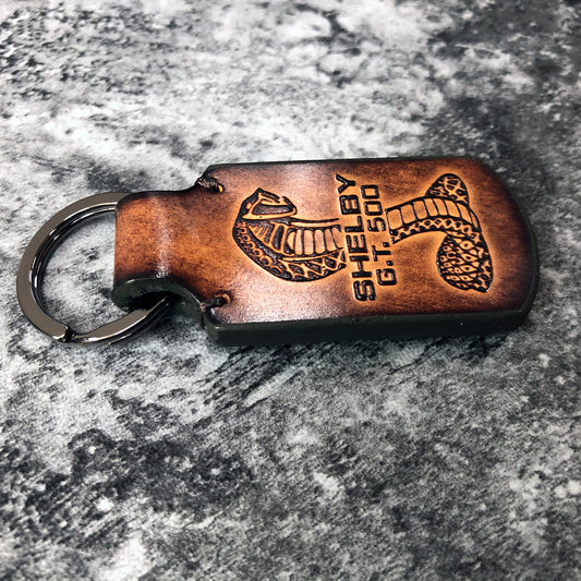 Shelby GT 500 vintage Leather keychain in Brown. Cobra symbol is embossed