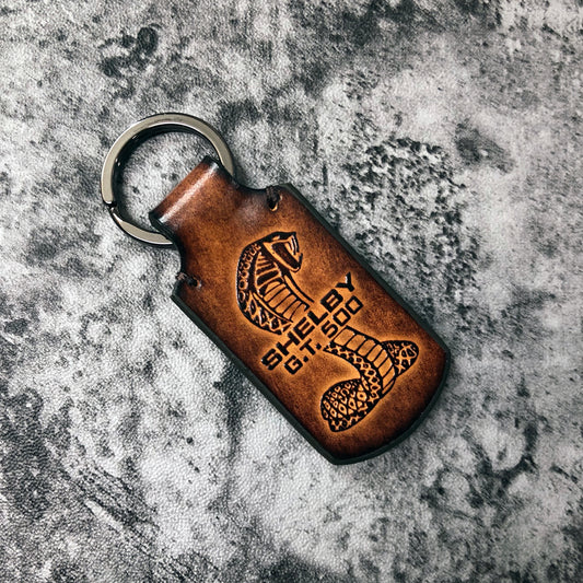 Shelby GT 500 vintage Leather keychain in Brown. Cobra symbol is embossed