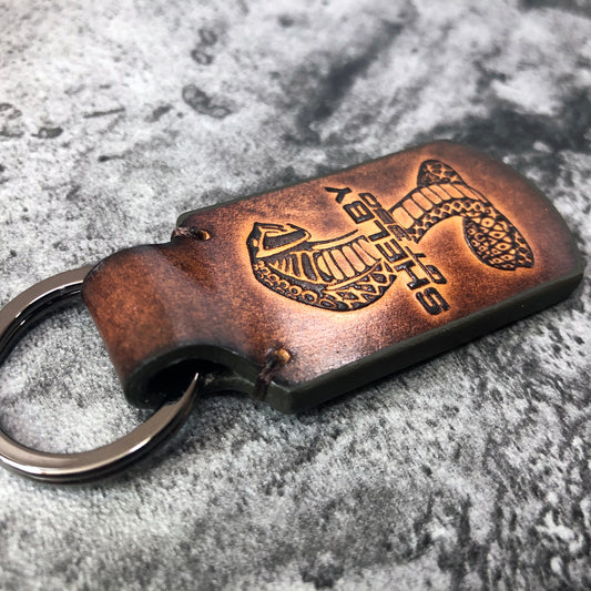 Shelby GT 350 vintage Leather keychain in Brown. Cobra symbol is embossed