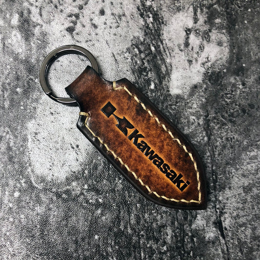 Motorcycle leather keychain in Brown(Pointed shape) Kawasaki is embossed