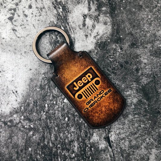 Handmade vintage Leather keychain in Brown. Embossed Jeep grill silhouette