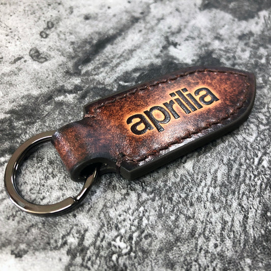 Aprilia is embossed, vintage Leather keychain in Brown(Pointed shape)