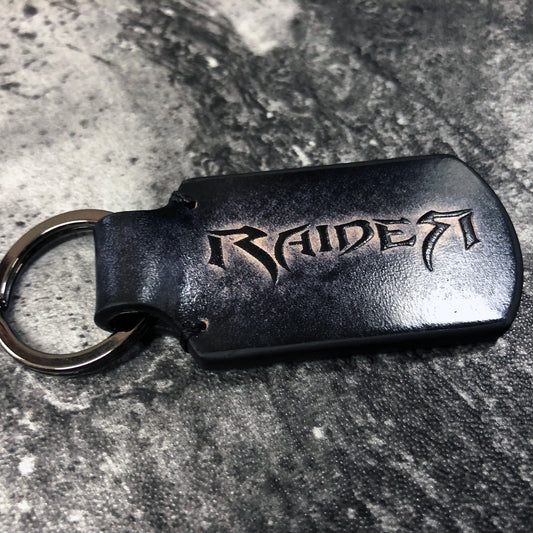 Handmade leather keychain in vintage Black. RaideR is embossed. Customizable