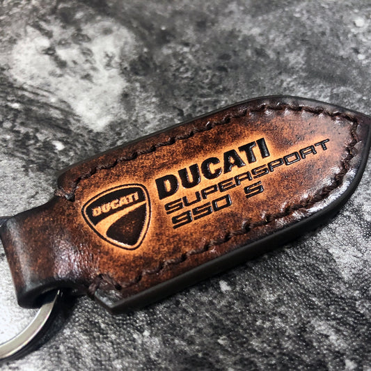 Supersport 950 is embossed, Leather keychain in Brown(Pointed shape)