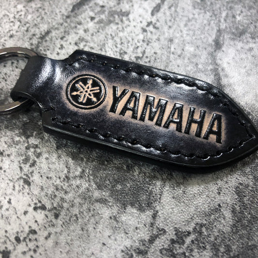 Motorcycle leather keychain in Black(Pointed shape) Yamaha is embossed