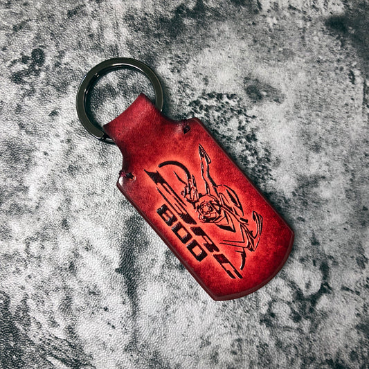 Handmade vintage leather keychain in Red. Customizable, Embossed F3RC 800 and silhouette. Customizable