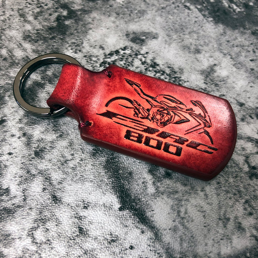 Handmade vintage leather keychain in Red. Customizable, Embossed F3RC 800 and silhouette. Customizable