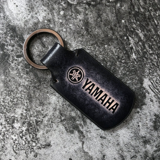 Handmade motorcycle leather keychain in Black. Yamaha is embossed