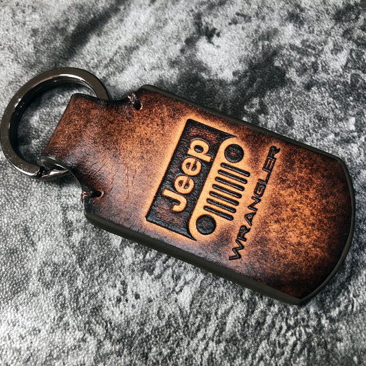 Wrangler vintage Leather keychain in Brown. Embossed Jeep grill silhouette