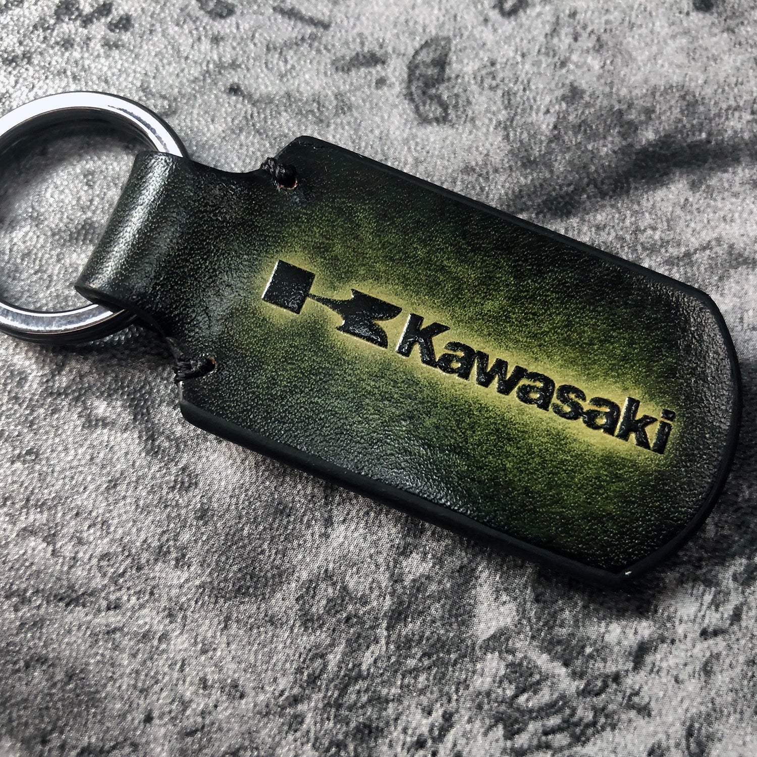 Kawasaki is embossed, handmade leather keychain in Dark Green – ZEIDI