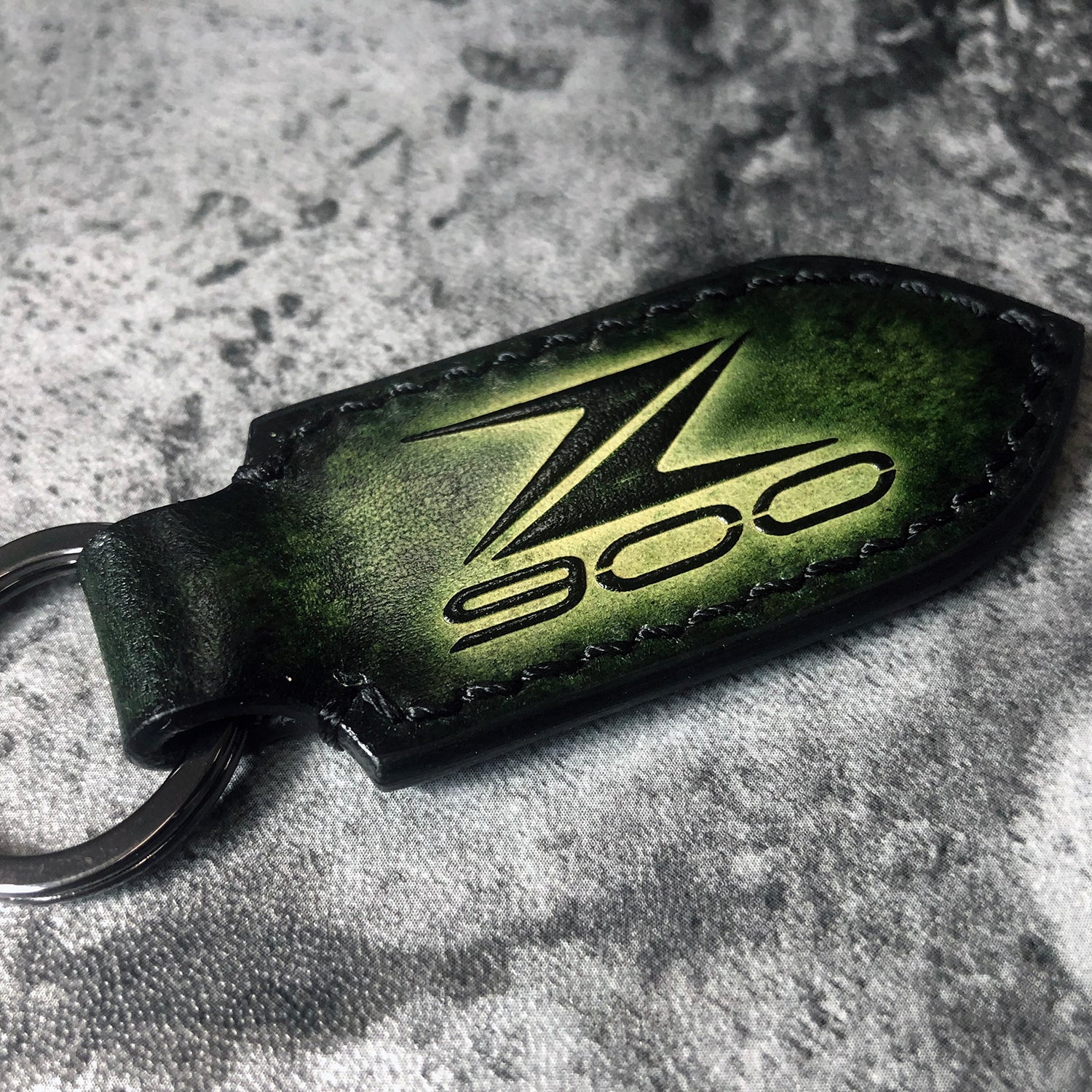 Kawasaki Z900 is embossed. Handmade Leather keychain in Dark Green