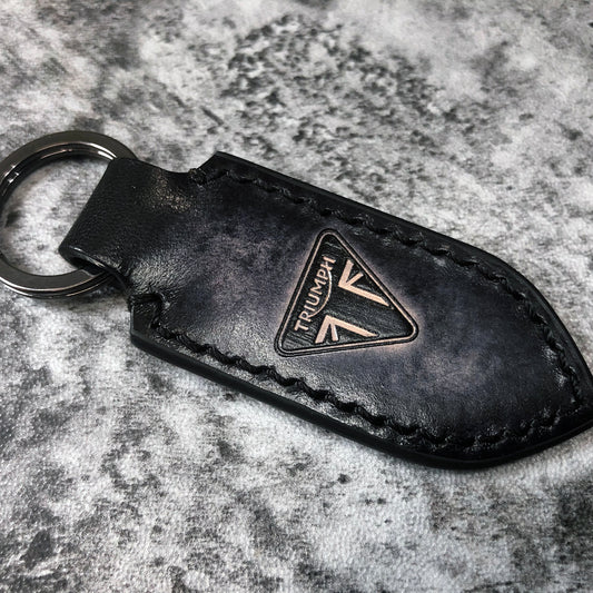 Handmade leather keychain in Black(Pointed shape) Triumph triangle is embossed