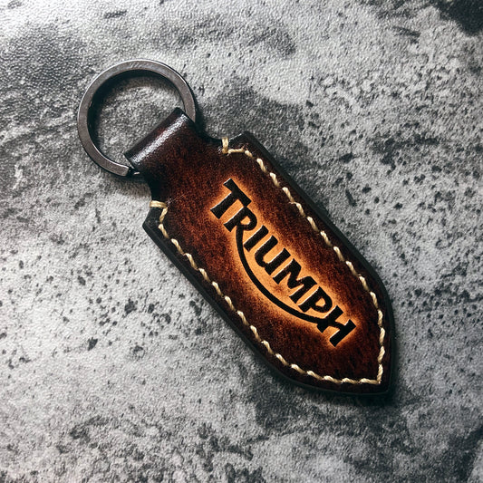 Handmade motorclcle Leather keychain in Brown(Pointed shape) Triumph is embossed