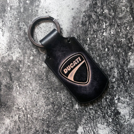 Ducati symbol embossed, vintage Leather keychain in Black. Customizable